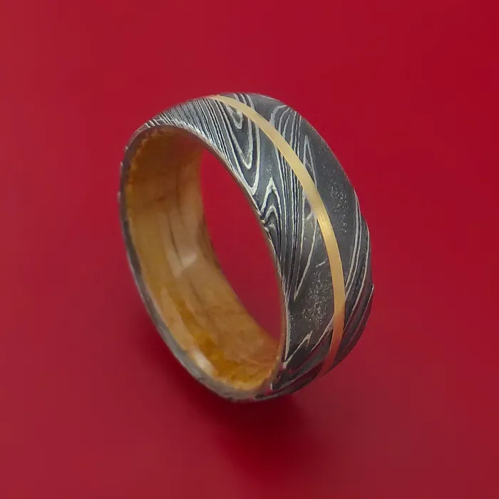 Kuro Damascus Steel Ring with 14k Yellow Gold Inlay and Interior Hardwood Sleeve Custom Made Band Lashbrook Rings Kuro Damascus Steel Ring with 14k Yellow Gold Inlay and Interior Hardwood Sleeve Custom Made Band Lashbrook Rings