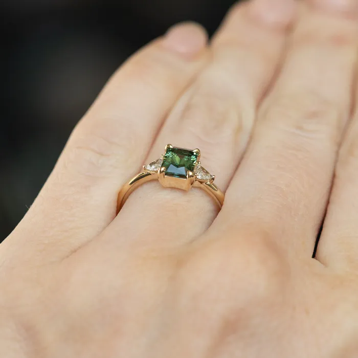116ct Teal Green Radiant Cut Montana Sapphire and Trillion Diamond Low Profile Three Stone ring in 14k Yellow Gold Anueva Jewelry Rings