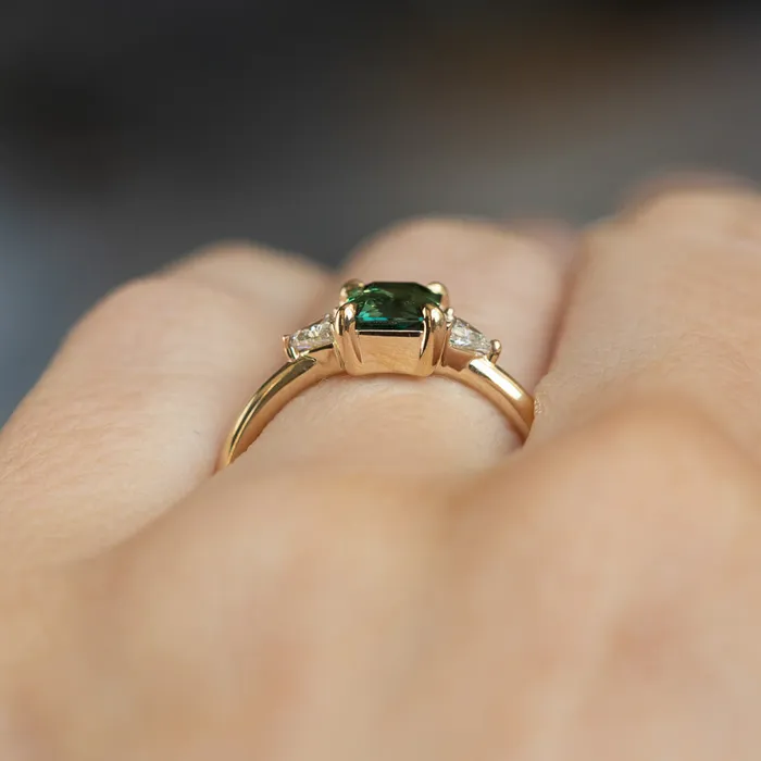 116ct Teal Green Radiant Cut Montana Sapphire and Trillion Diamond Low Profile Three Stone ring in 14k Yellow Gold Anueva Jewelry Rings