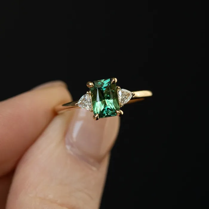 116ct Teal Green Radiant Cut Montana Sapphire and Trillion Diamond Low Profile Three Stone ring in 14k Yellow Gold Anueva Jewelry Rings