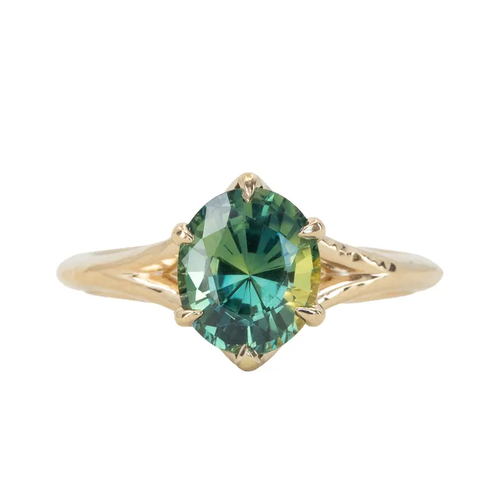 Anueva Jewelry Rings 240ct Oval Teal Green Parti Sapphire Evergreen Carved Split Shank Six Prong Ring in 14k Yellow Gold Anueva Jewelry Rings 240ct Oval Teal Green Parti Sapphire Evergreen Carved Split Shank Six Prong Ring in 14k Yellow Gold