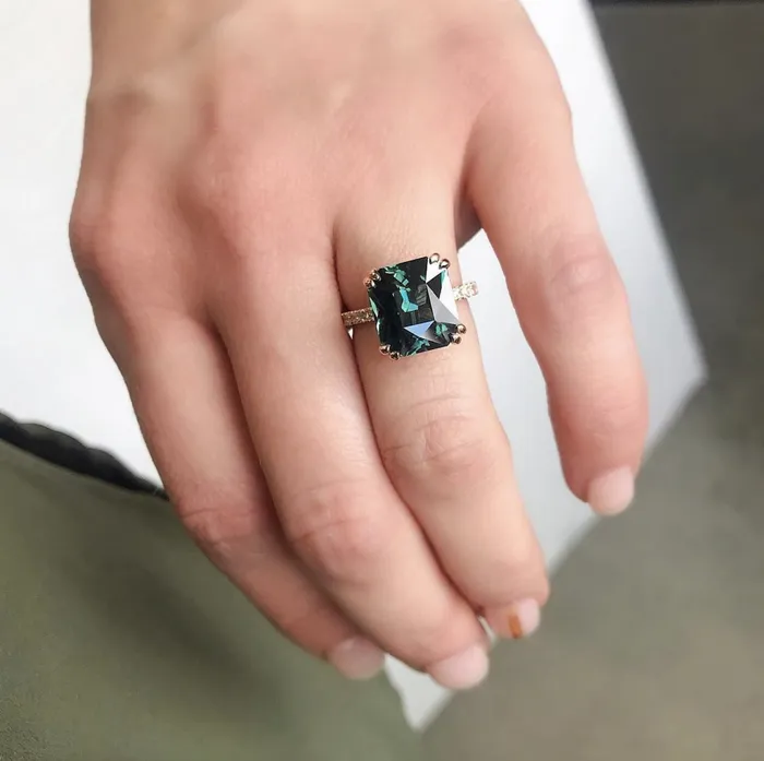 Anueva Jewelry Rings 567ct Radiant Cut Teal Sapphire Ring with French Set Diamond Studded Band in 18k Rose Gold