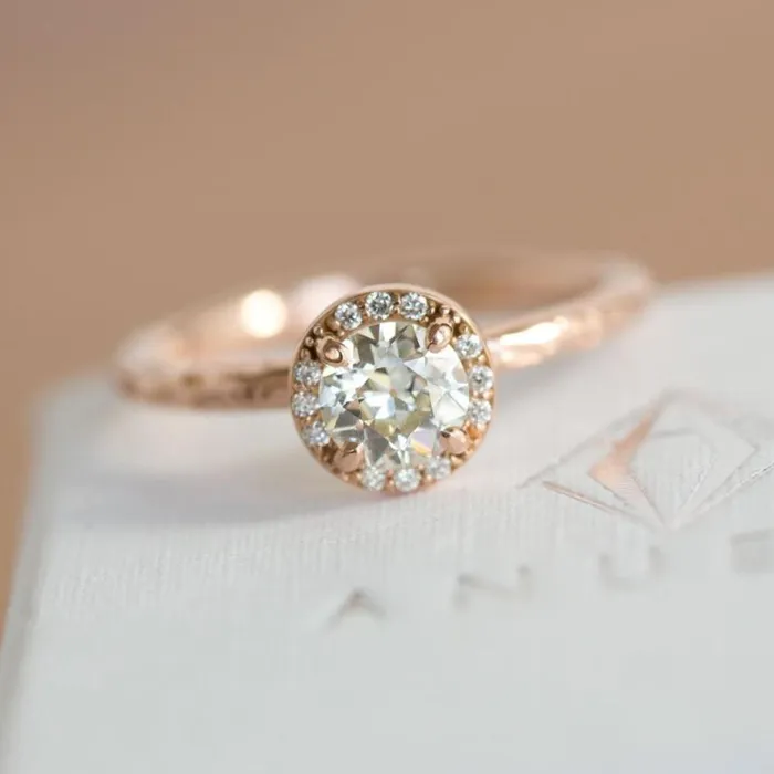 Rings Anueva Jewelry 060ct Old European Cut Antique Diamond in Rose Gold Halo and Evergreen Band Rings Anueva Jewelry 060ct Old European Cut Antique Diamond in Rose Gold Halo and Evergreen Band
