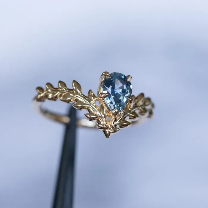 Rings Anueva Jewelry 085ct Blue Pear Sapphire Pointed Vine Prong Set Ring in 14k yellow gold